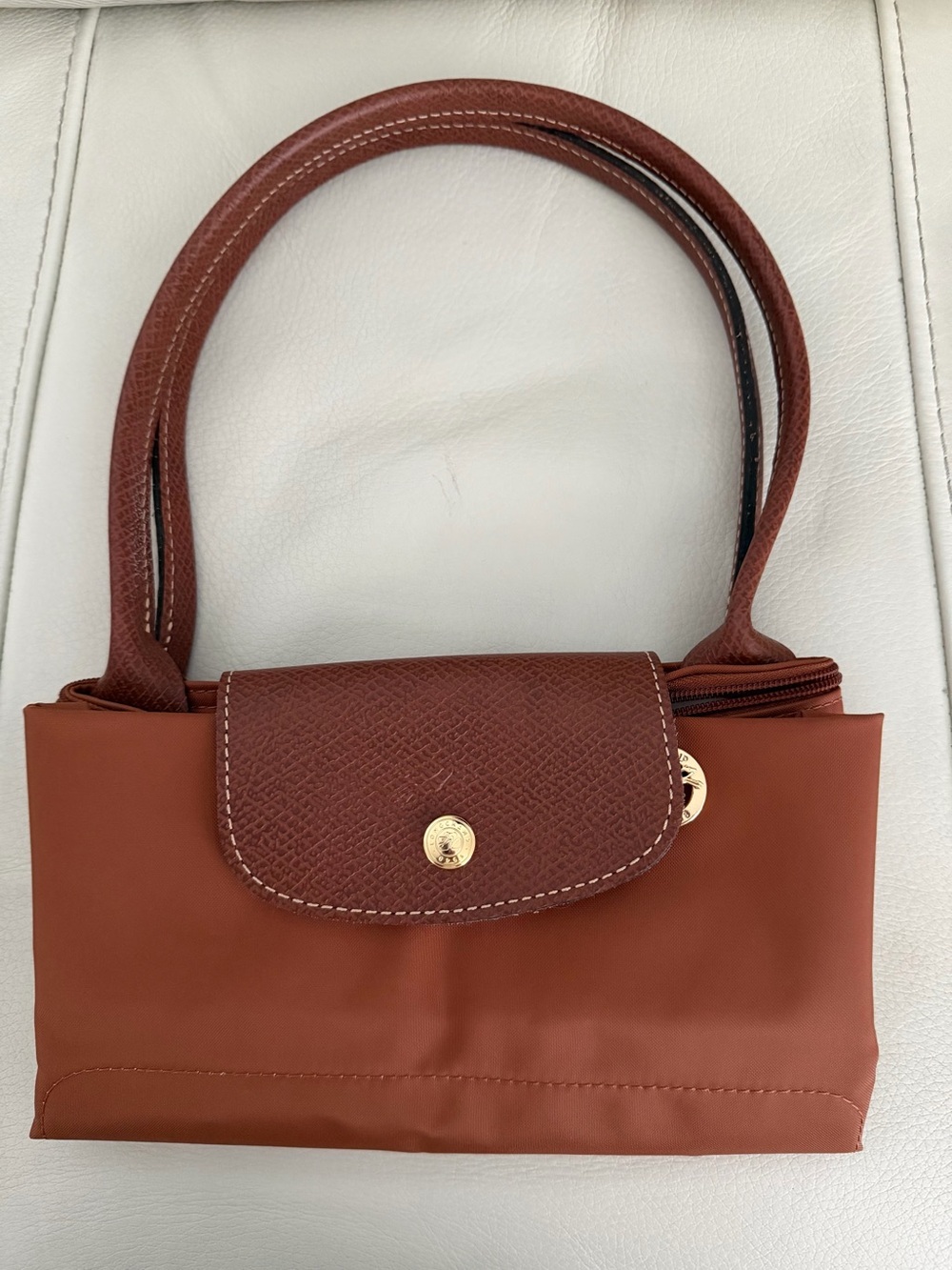 Longchamp rust brown shoulder bag with gold hardware